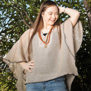Demasiado poncho knitted